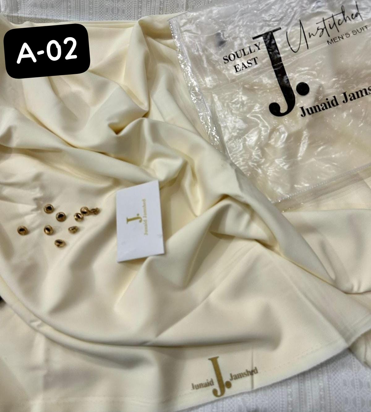 CREAM BOSKI UNSTITCHED KAMEEZ SHALWAR FABRIC | JUNAID JAMSHED
